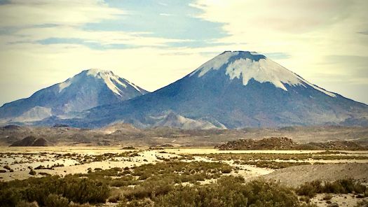https://mdw-travel-data-us-east-1.s3.amazonaws.com/img/country/Chile/Pomerape-Volcano/img_02.jpg