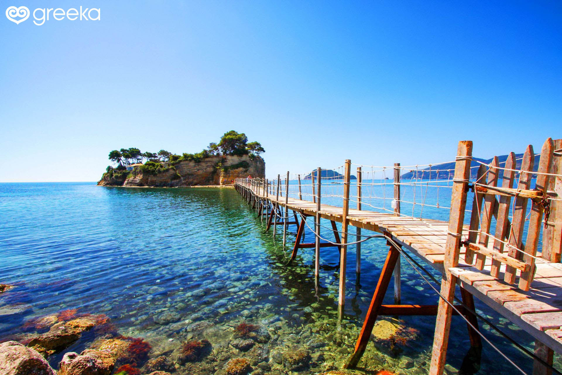 https://mdw-travel-data-us-east-1.s3.amazonaws.com/img/country/Greece/Agios-Sostis-Beach/img_01.jpg