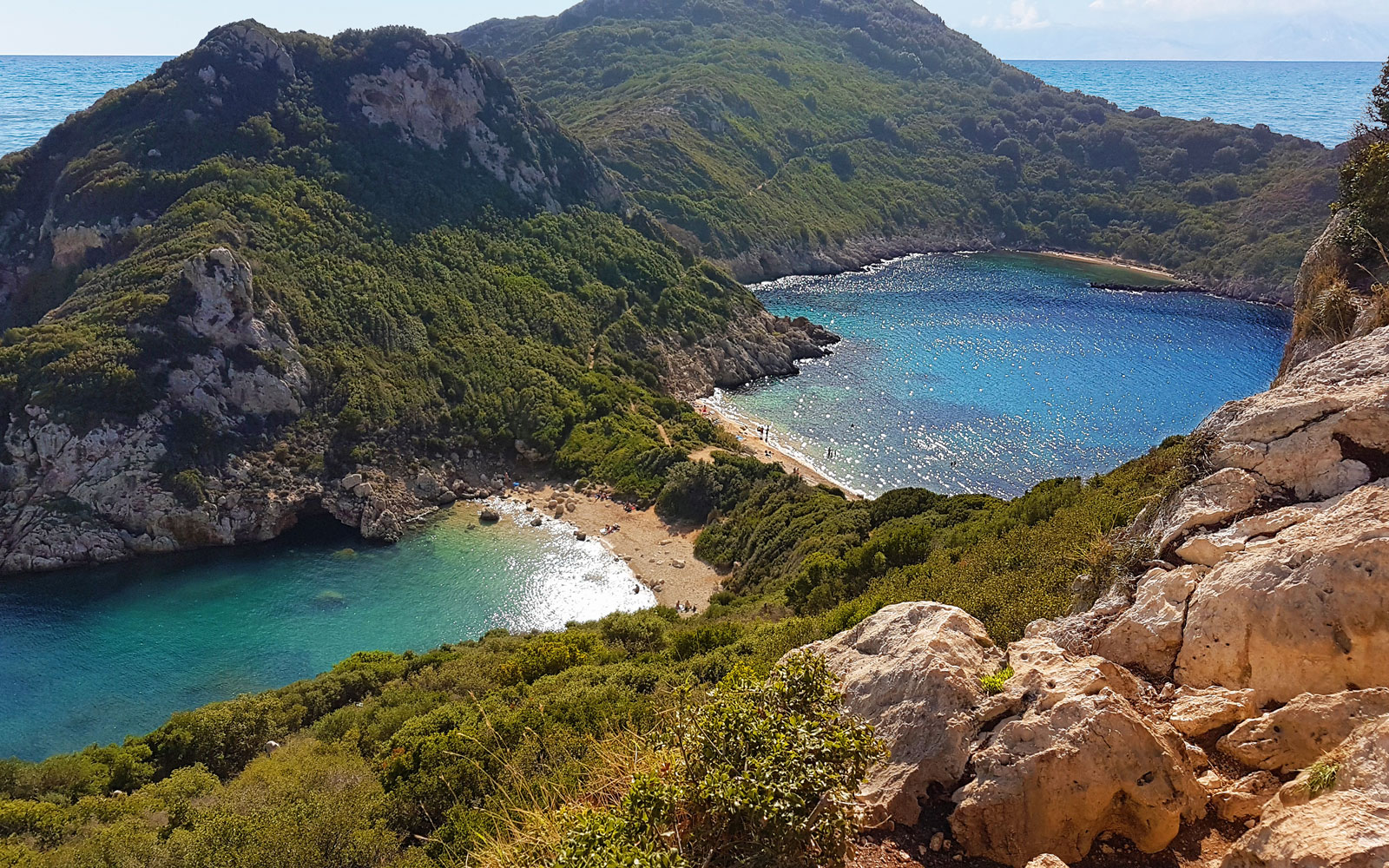 https://mdw-travel-data-us-east-1.s3.amazonaws.com/img/country/Greece/Porto-Timoni-Beach/img_00.jpg