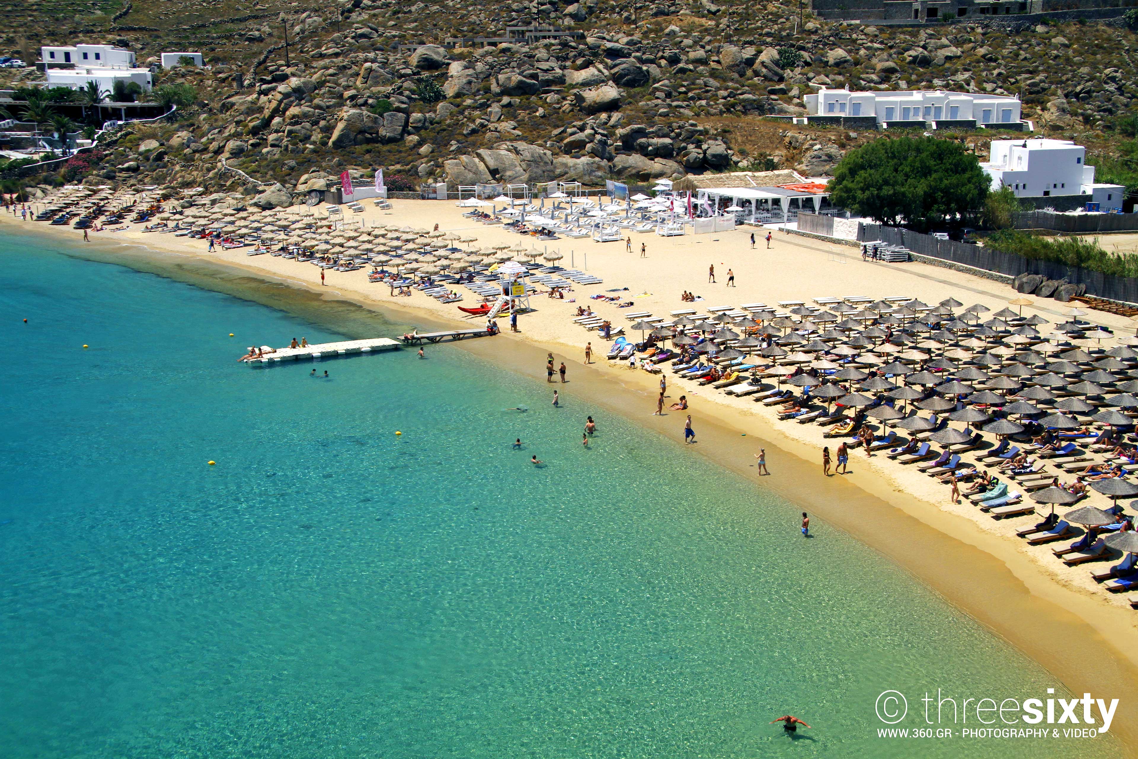 https://mdw-travel-data-us-east-1.s3.amazonaws.com/img/country/Greece/Super-Paradise-Beach/img_01.jpg