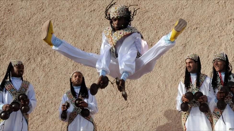 https://mdw-travel-data-us-east-1.s3.amazonaws.com/img/country/Morocco/Gnaoua-Musicians/img_03.jpg