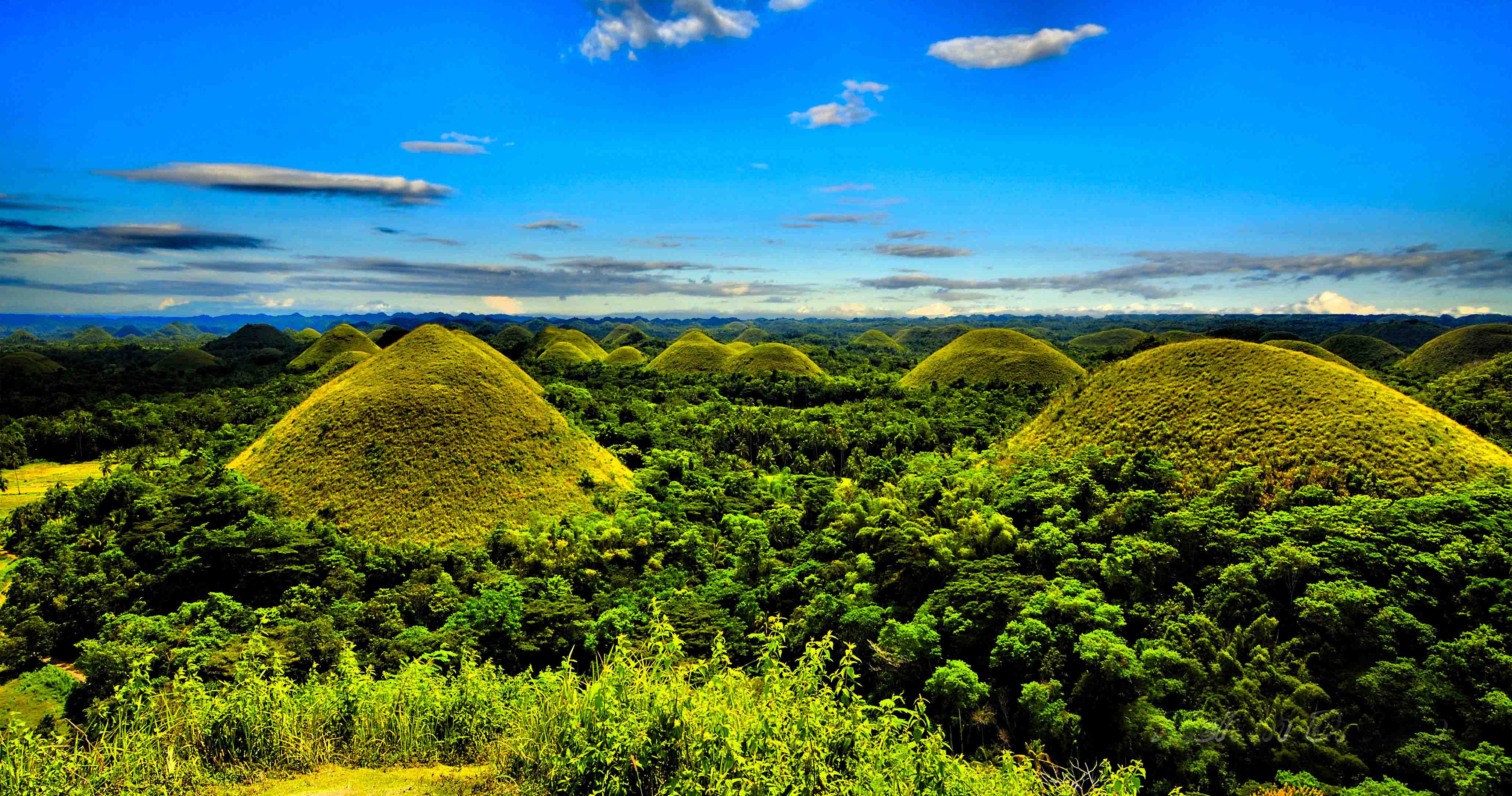 https://mdw-travel-data-us-east-1.s3.amazonaws.com/img/country/Philippines/Chocolate-Hills/img_00.jpg
