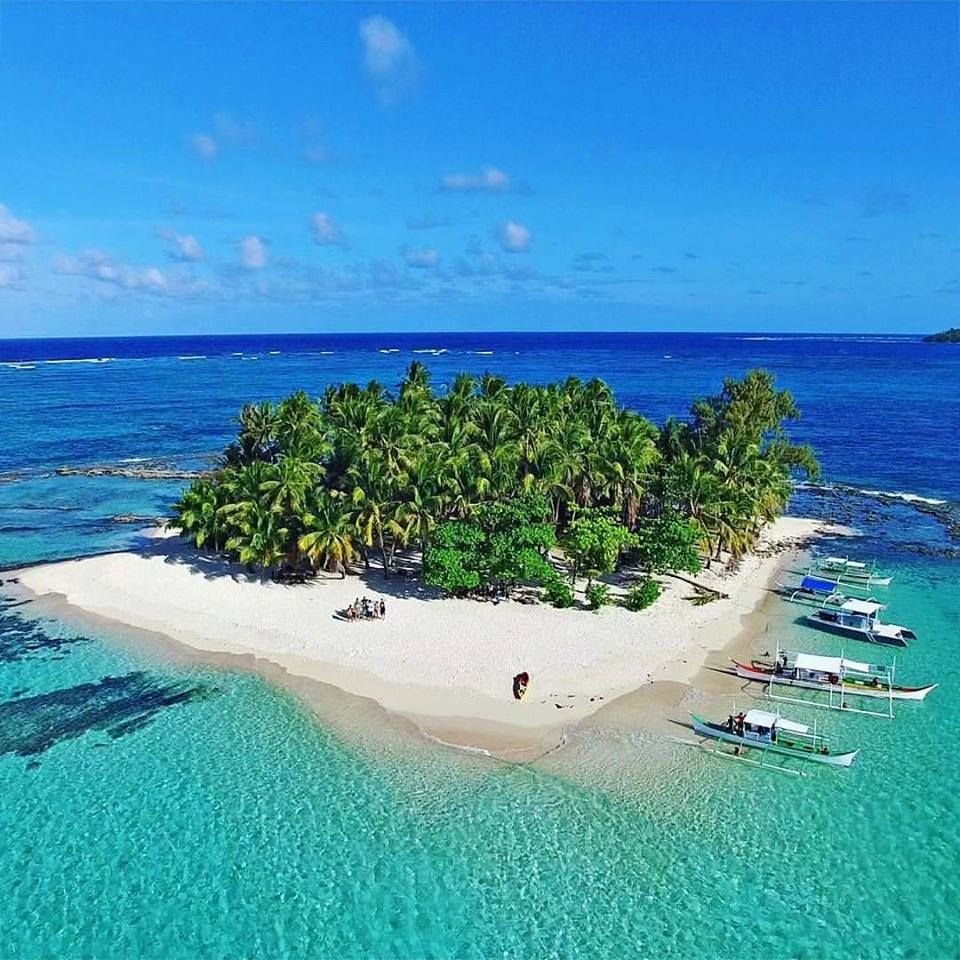 https://mdw-travel-data-us-east-1.s3.amazonaws.com/img/country/Philippines/Guyam-Island/img_00.jpg
