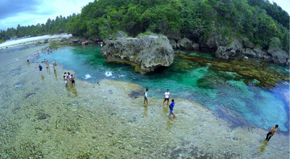 https://mdw-travel-data-us-east-1.s3.amazonaws.com/img/country/Philippines/Magpupungko-Rock-Pools/img_02.jpg