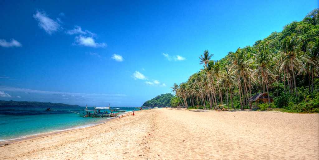 https://mdw-travel-data-us-east-1.s3.amazonaws.com/img/country/Philippines/Puka-Shell-Beach/img_00.jpg