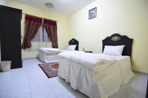 https://mdw-travel-data-us-east-1.s3.amazonaws.com/img/country/Saudi-Arabia/Al-Eairy-Apartments--Riyadh-3/img_00.jpg