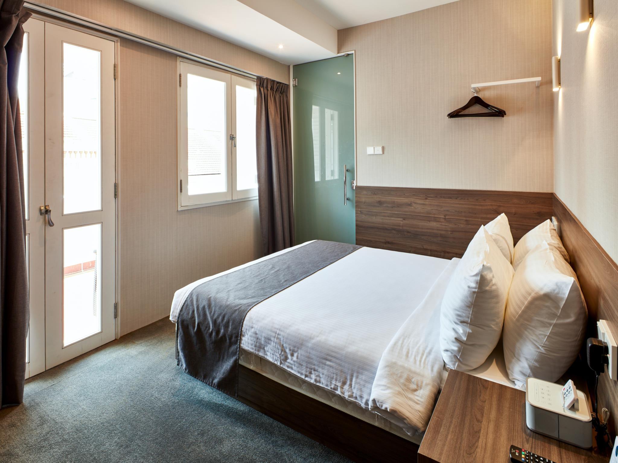 https://mdw-travel-data-us-east-1.s3.amazonaws.com/img/country/Singapore/Arcadia-Hotel/img_03.jpg
