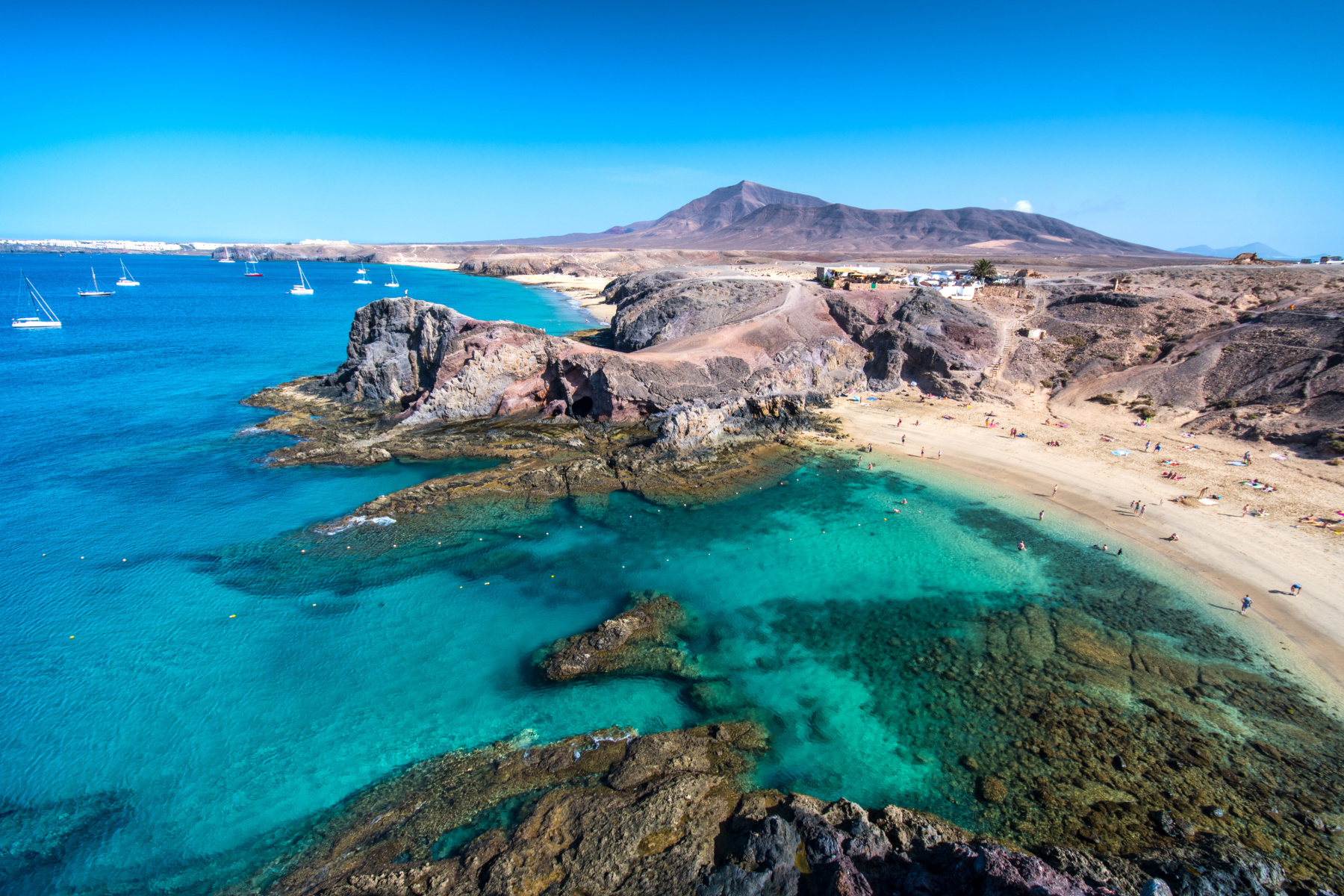 https://mdw-travel-data-us-east-1.s3.amazonaws.com/img/country/Spain/Papagayo-Beach/img_00.jpg
