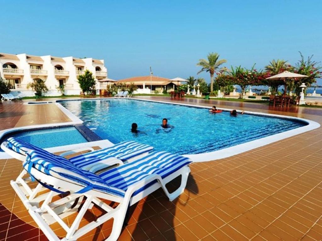 https://mdw-travel-data-us-east-1.s3.amazonaws.com/img/country/United-Arab-Emirates/Barracuda-Beach-Resort/img_01.jpg